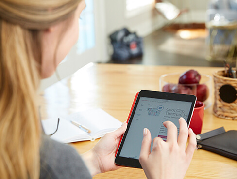 a women sitting at a laptop