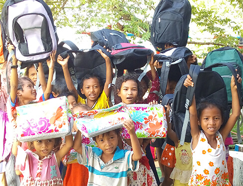 kids receiving charitable donations